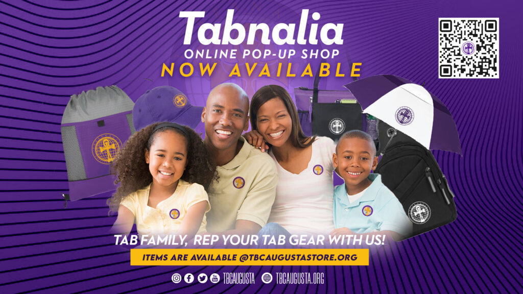 Black family wearing clothing with Tabernacle Baptist Church on it